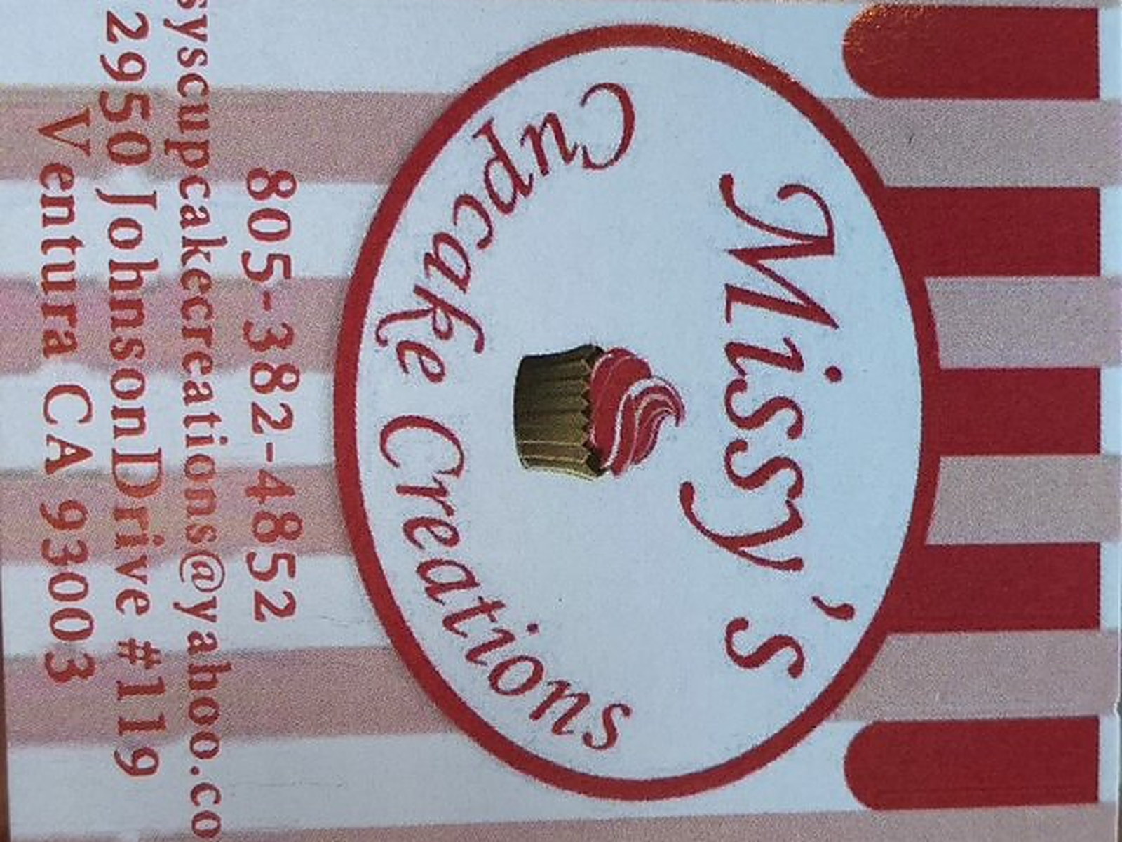 Boxed in the striped box — the shop's own box with the address on the lid